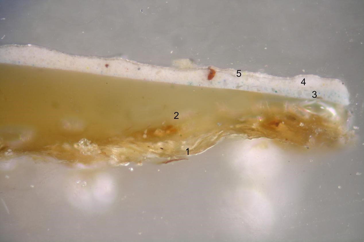 Próbka nr 1, warstwa malarska z partii nieba wraz z tekturowym podłożem
