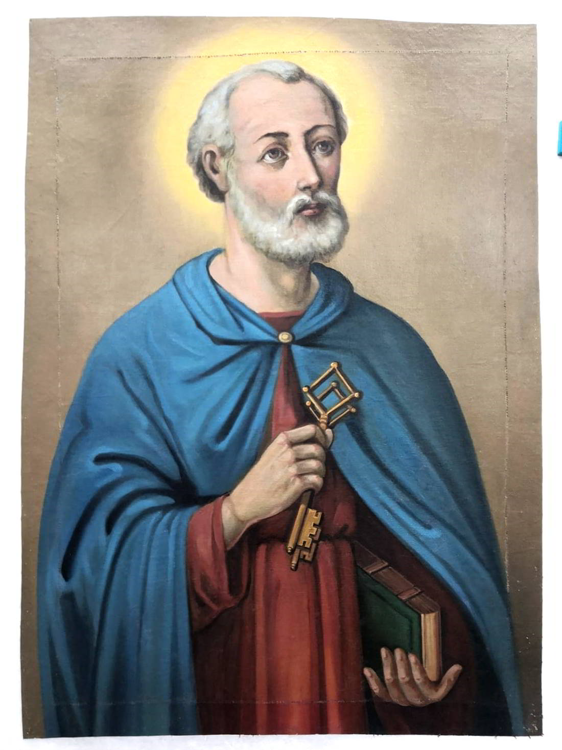 wizerunek św. Piotra. Mężczyzna ubrany w niebieski płaszcz i czerwoną szatę, w prawej ręce trzyma klucze - stan po konserwacji